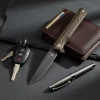 Nóż składany Womsi Wolf, stal S90V/420, rękojeść G10 brązowo-czarna, z klipsem