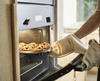 Forma na 12 muffinów Joseph Joseph Nest Bake ze stali węglowej, niebieska
